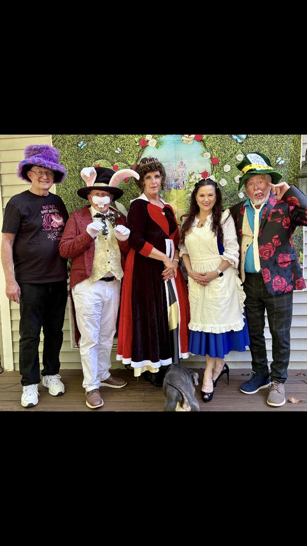 WOW members in Alice in Wonderland costumes